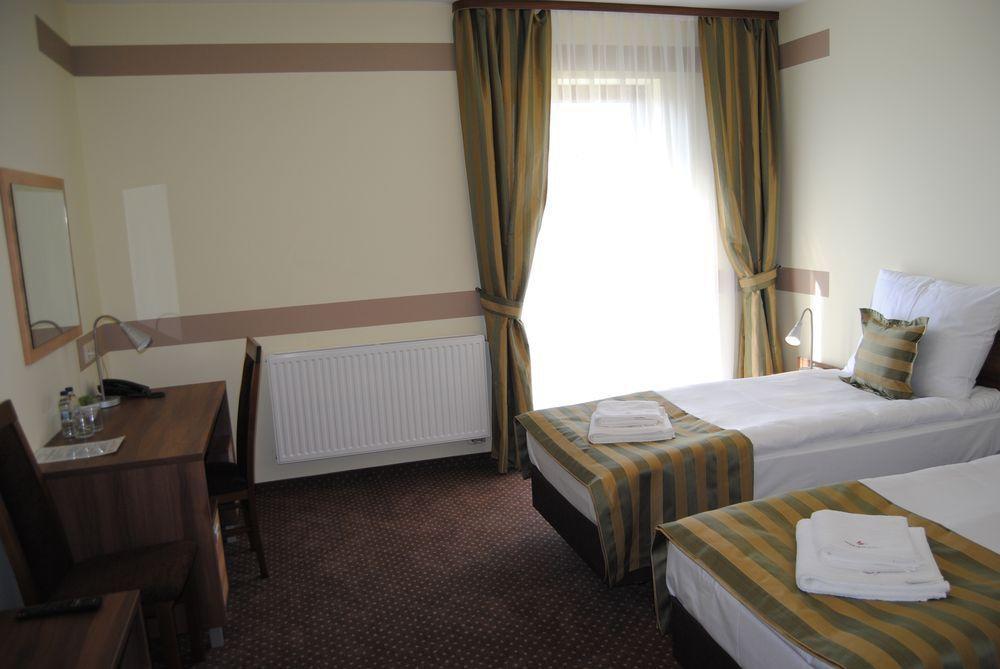 Hotel Magnolia Tychy Quarto foto