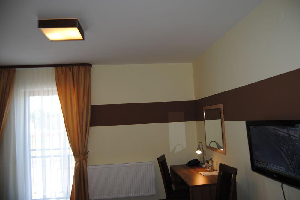 Hotel Magnolia Tychy Quarto foto