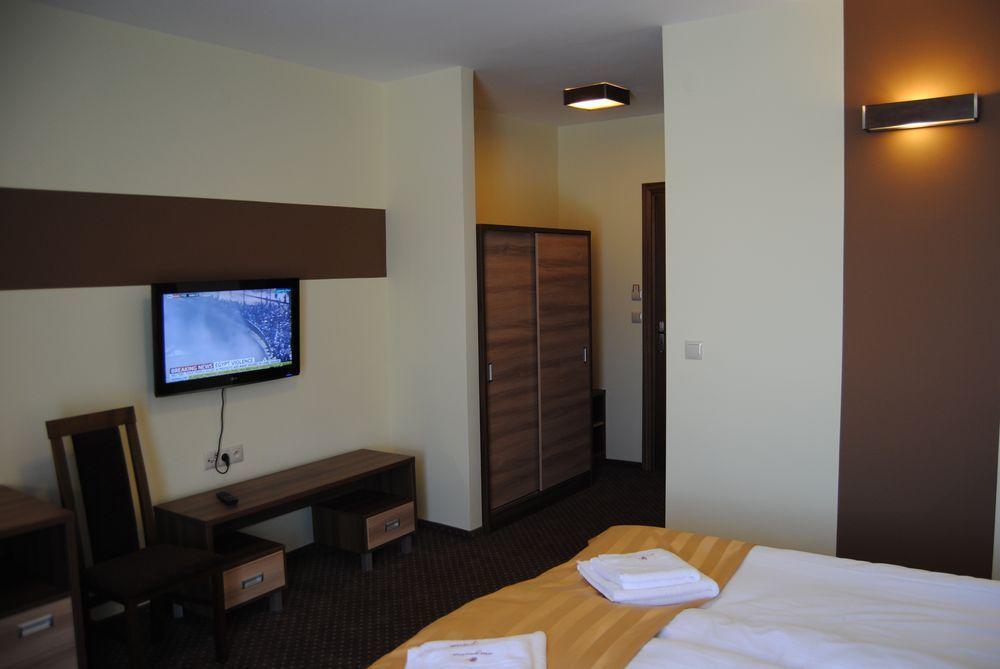 Hotel Magnolia Tychy Quarto foto